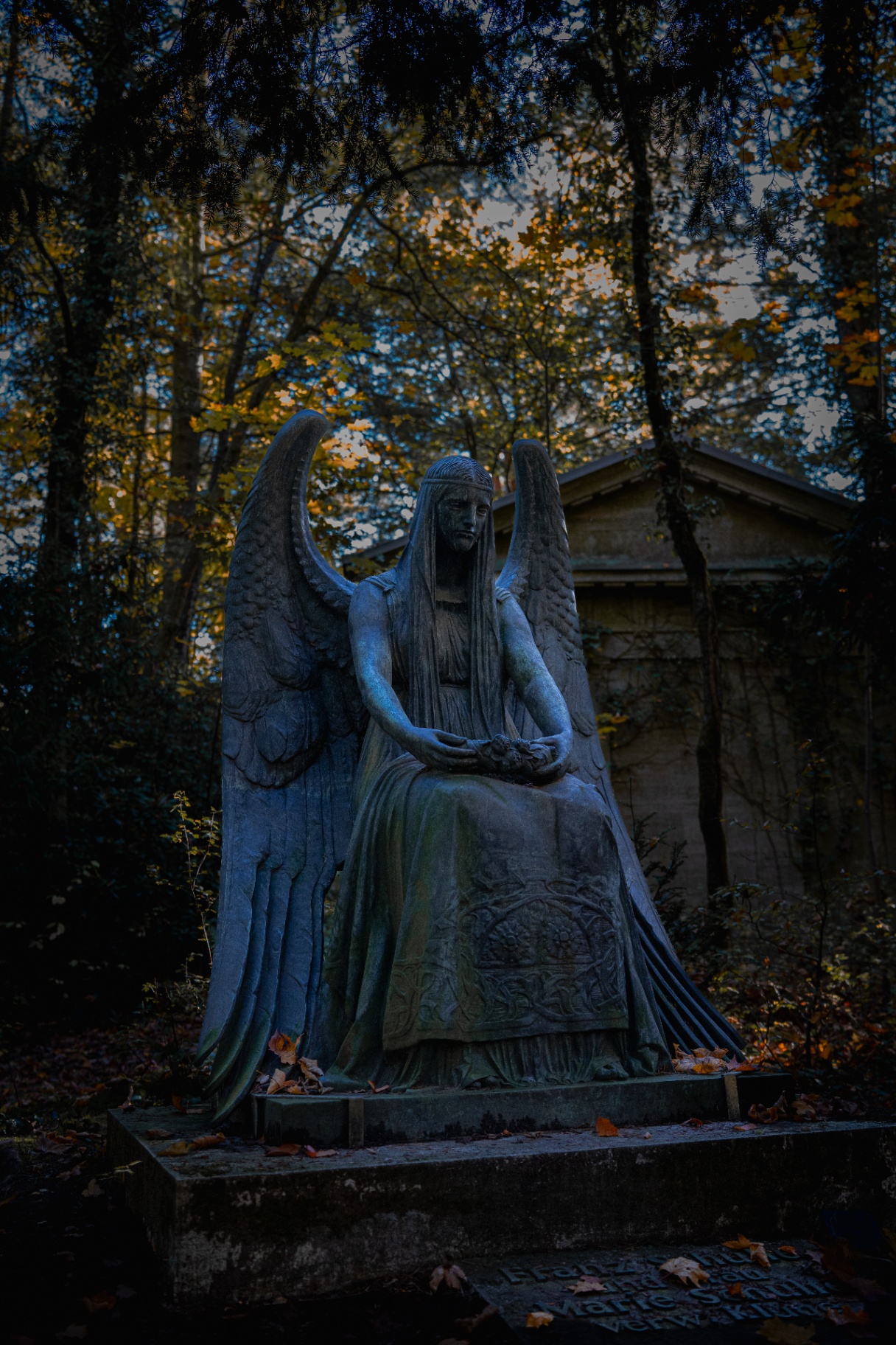 Veiled angel statue at dusk